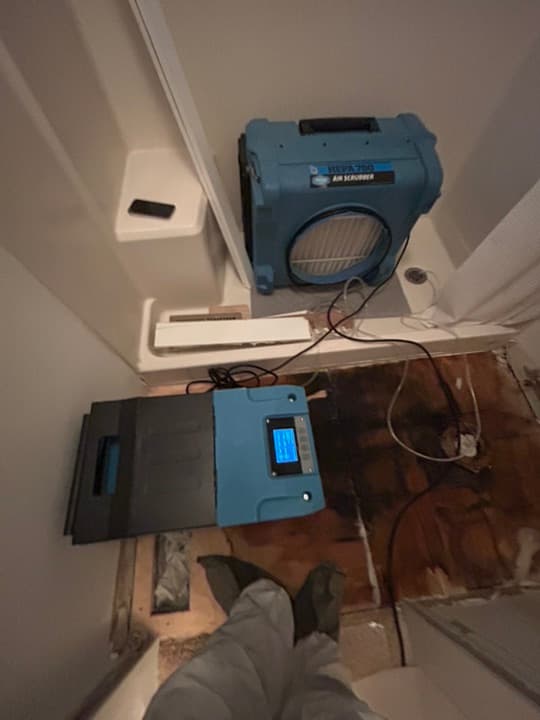 Industrial Dehumidifier in Damaged Bathroom