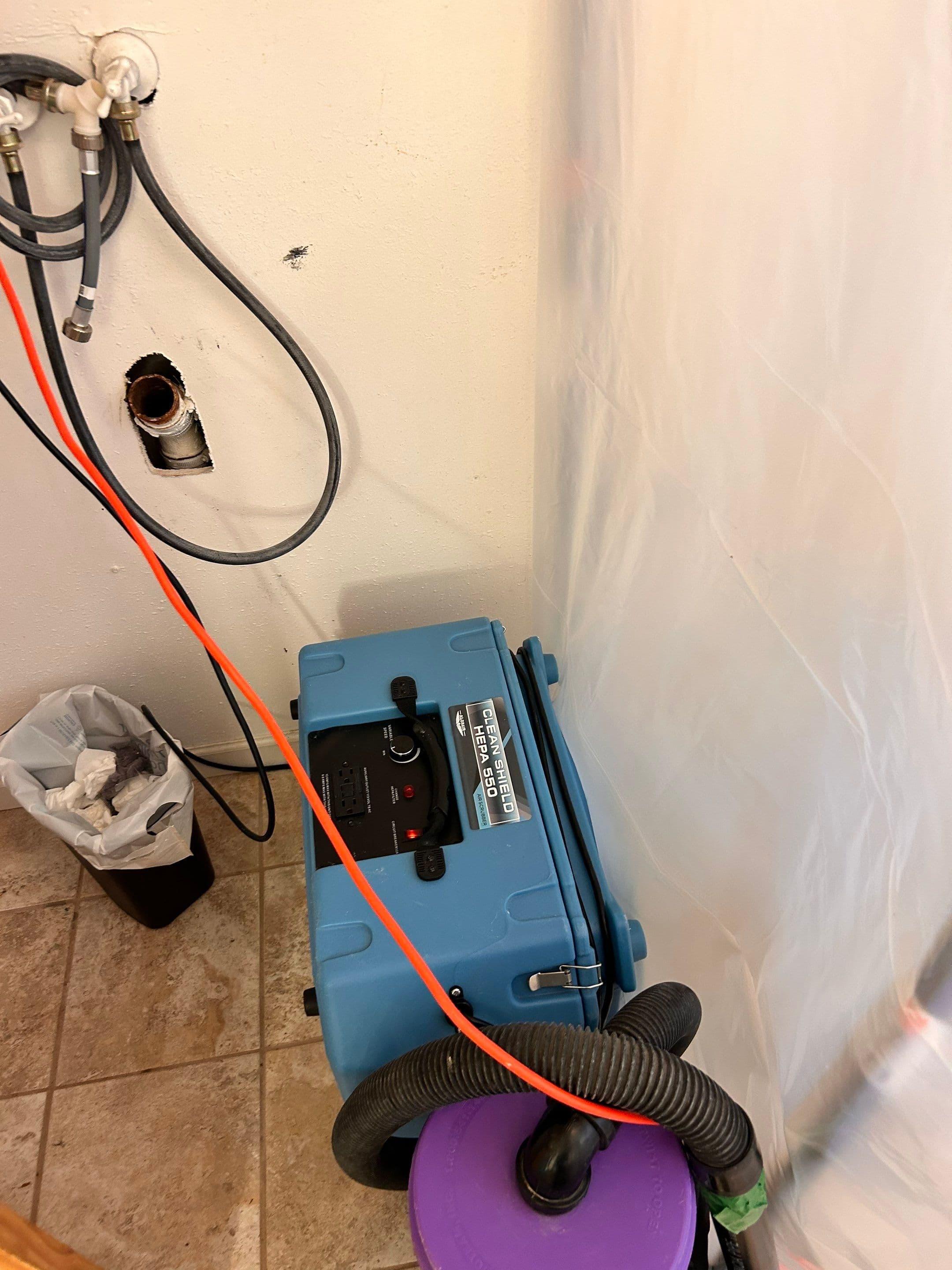 Structural drying setup with air movers and dehumidifiers